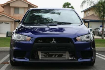 2014 Mitsubishi Lancer Evolution X GSR.

5-Speed Manual, 757-hp Turbo 4-Cylinder, Over $54,300 in Modifications