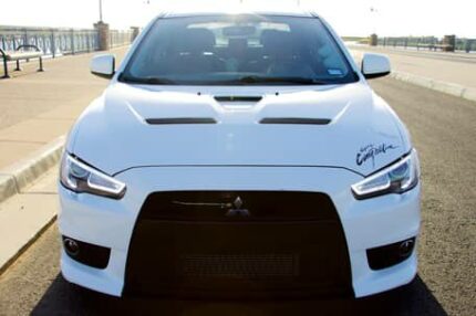 2013 Mitsubishi Lancer Evolution X GSR. 

5-Speed Manual, Turbo 4-Cylinder, AWD, Extensive Modifications