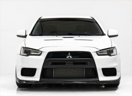2011 Mitsubishi Lancer Evolution GSR

5-Speed Manual Transmission; 42,619 miles