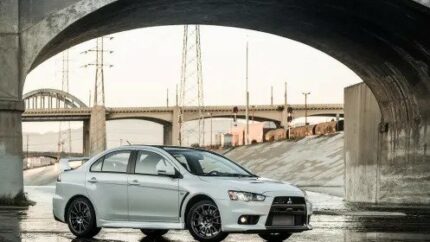 2015 Lancer Evolution Final Edition.

5-speed transmission paired with a turbocharged and intercooled DOHC 16-valve 4-cylinder 2.0L engine.