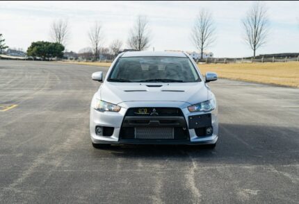 2015 Mitsubishi Lancer Evolution X GSR

turbocharged 2.0-liter inline-four linked to a five-speed manual transmission and a Super All-Wheel Control all-wheel-drive system; 25000 miles