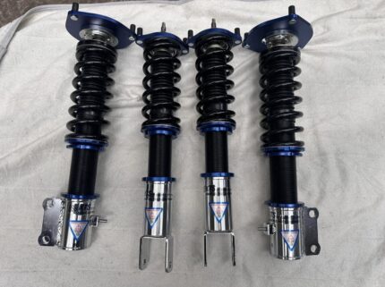 Brand New Full set of four KTS SC Damper System Beta Coilovers featuring plated steel shock bodies, blue locking collars, black performance springs, and adjustable top mounts for Mitsubishi Lancer Evo 9..