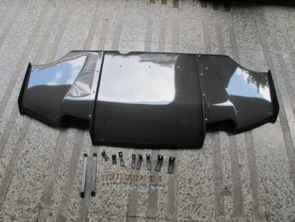 Mitsubishi Lancer Evolution X Varis-style carbon fiber rear diffuser layout complete with mounting brackets and hardware.