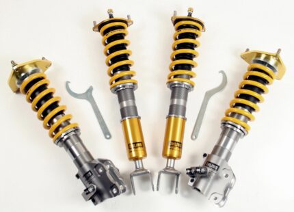 Brand New OEM Öhlins Road & Track coilover kit (Part No: MIS MI01S2) for Mitsubishi Lancer Evolution 7–9 features Dual Flow Valve technology, upside-down front struts, and individual ride-height adjustability.