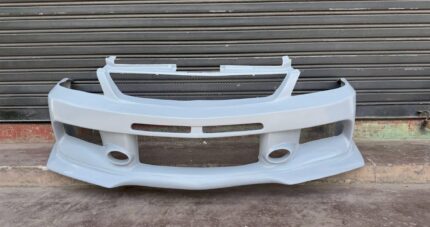 Mitsubishi Lancer Evolution IX bodykits featuring integrated mesh grilles and circular brake cooling ducts.
