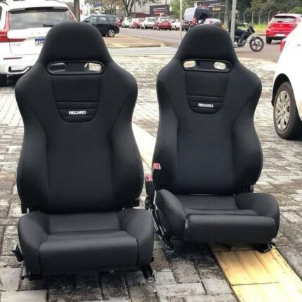 Recaro SP-JJ Black Edition seats feature a reclining design with adjustable leg extensions.