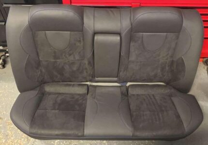 OEM Recaro bucket seats featuring Ralliart branding, Lancer Evolution 9 Factory front and rear seats with seat railings